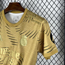 CAMISA DO REAL MADRID 25/26 DOURADO TREINO